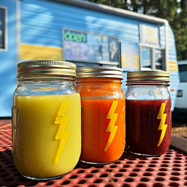 Three jars of fresh cold-pressed juice