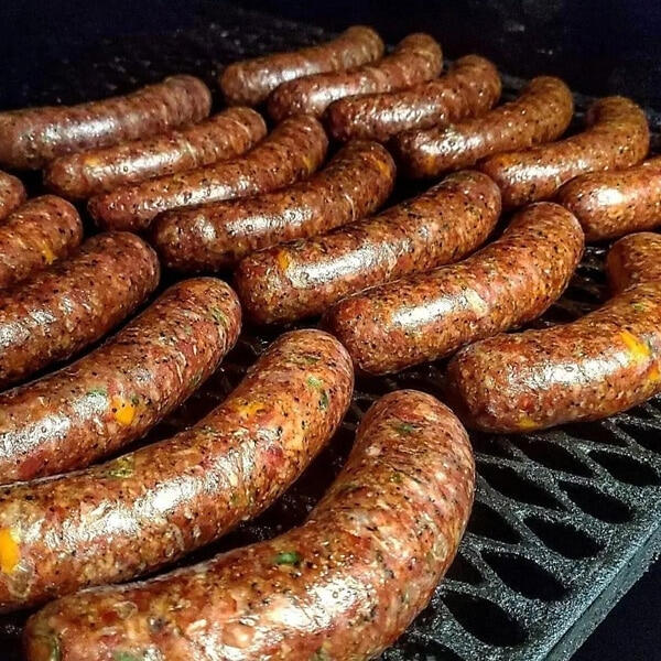 House-made sausages in the smoker House-made sausages in the smoker