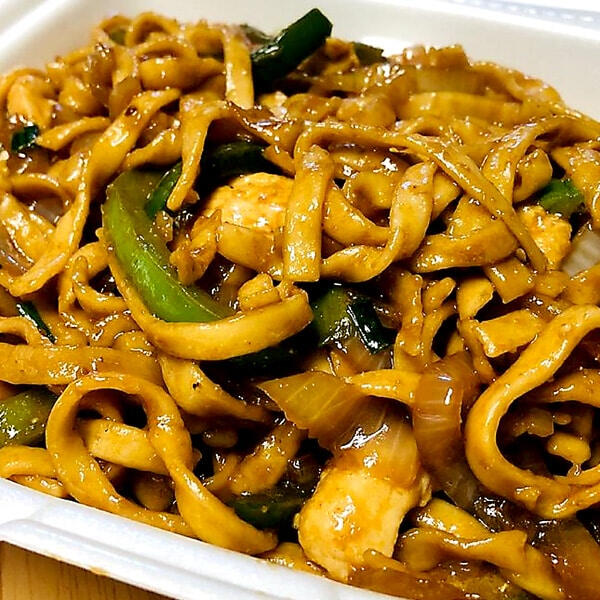 Hand pulled noodles with vegetables and sauce from Là Authentic Chinese Food